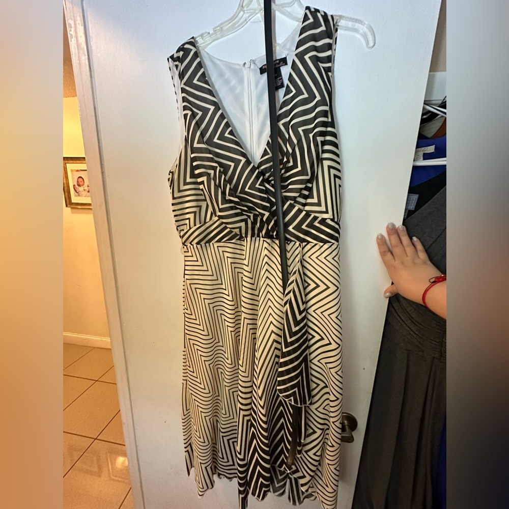 Brown and cream dress with belt.